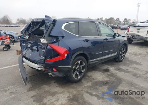 2017 Honda Cr-V Touring z USA, uszkodzony, nr VIN 5J6RW2H90H1012038